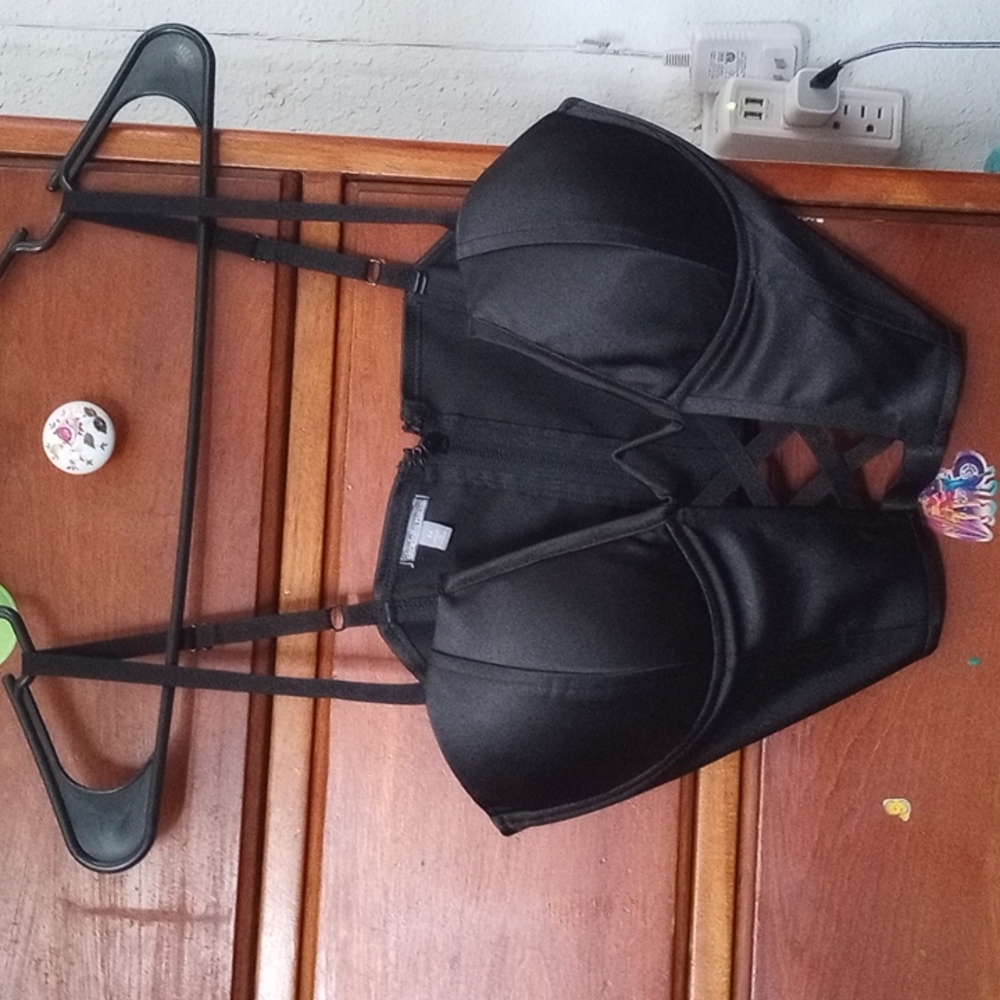 Black top, adjustable straps, zipper back